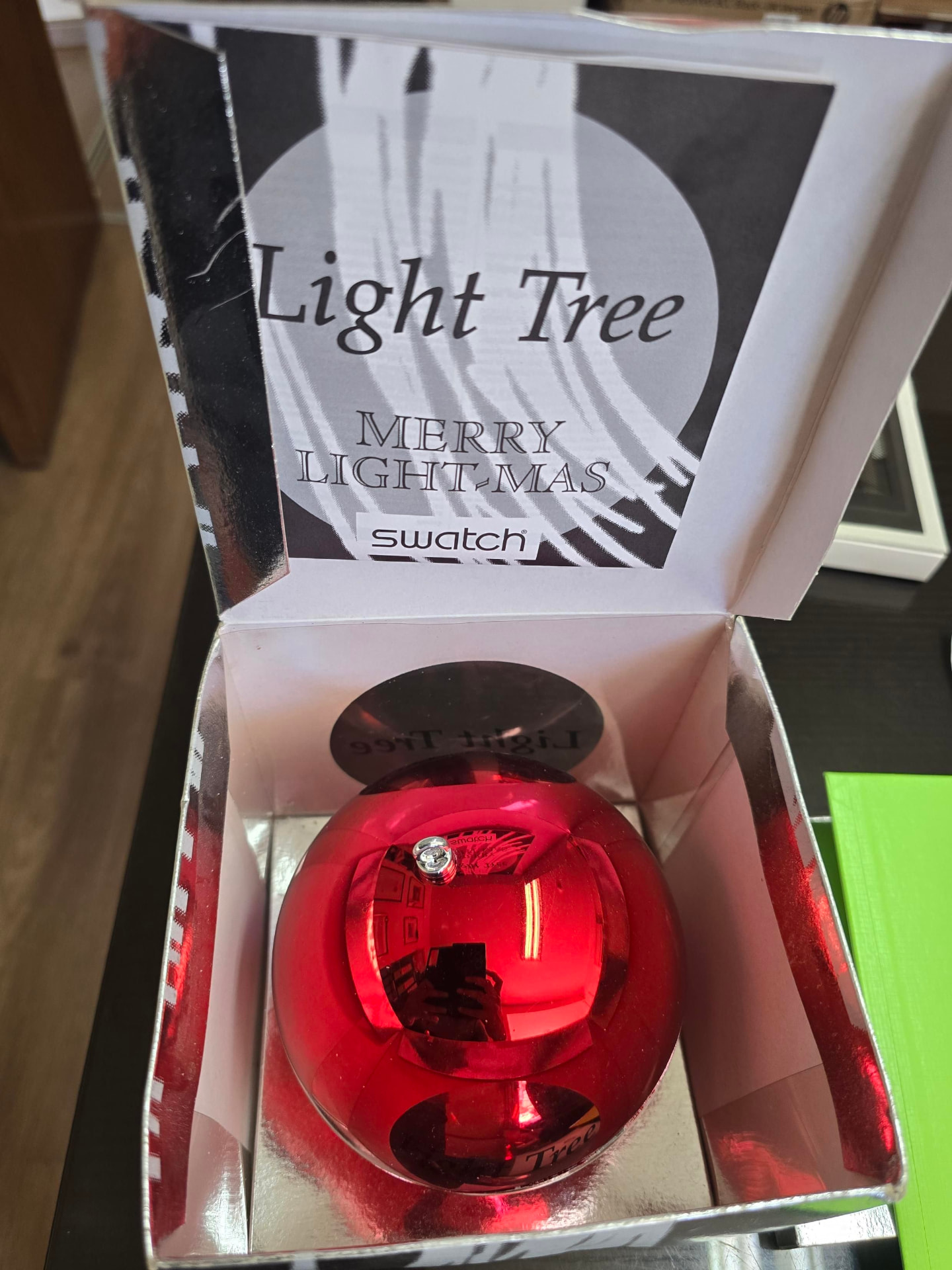 Swatch Light Tree watch in its original presentation box
